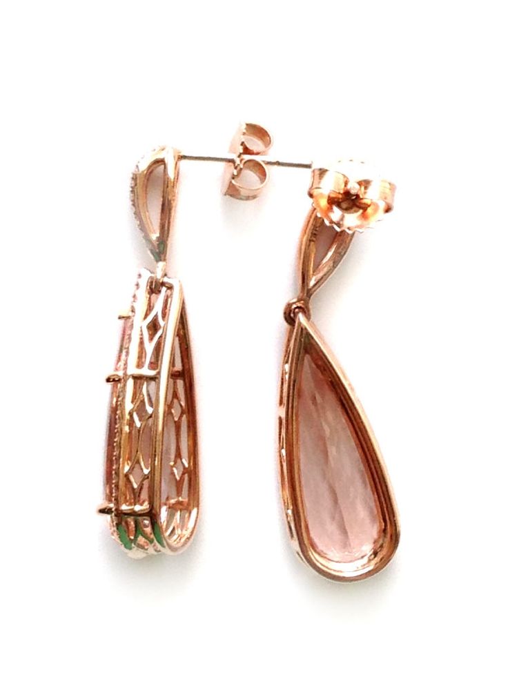 Lovely gemstones set in rose gold, these 9.52 carat mystical Morganites add a touch of fresh sexiness to these earrings. Set in 14K gold, there will be no denying the durability of these earrings paired with the everlasting salmon colored beryl. Although cousin to the Emerald, Morganites are very different and are exceptionally clear making this gem a treat to look at. Paired with diamonds upon an intricate gold mesh, these earrings will be eternally trendy. 
ECK30127-MORG
#376979 Luxury Rose Gold Teardrop Earrings, 14k Rose Gold Earrings With Elegant Design, Elegant Rose Gold Earrings In 14k Gold, Formal Pink Gold Gemstone Earrings, Elegant 14k Rose Gold Round Earrings, Luxury Rose Gold Oval Earrings, Rose Gold Pear-shaped Diamond Earrings, Pear-shaped Rose Gold Earrings For Formal Occasions, Rose Gold Pear-shaped Earrings For Formal Occasions