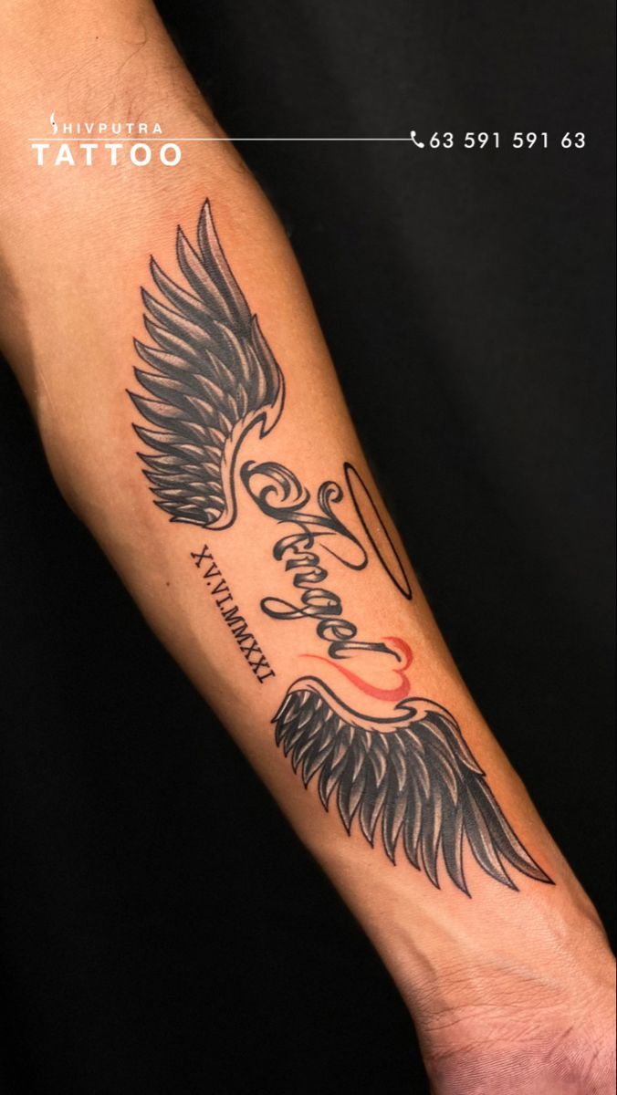 a man's arm with a tattoo on it and an eagle in the middle