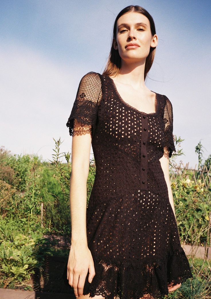 Unapologetically feminine. Cotton eyelet patchwork, crochet-style sleeves and trims, and a super-flattering fit, Ori dress is what dreams are made of. FINAL SALE Details and fit -Fully lined -Scoop neckline, front buttons are decorative -Closes with zip on back -Model wears XS -100% COTTON Fitted Crochet Dress With Lace Patchwork, Mini Length, Fitted Crochet Mini Dress With Lace Patchwork, Fitted Lace Dresses With Eyelet Details, Fitted Eyelet Midi Dress, Fitted Eyelet Dress, Midi Length, Fitted Eyelet Dress Midi Length, Summer Fitted Lace Dress With Broderie Anglaise, Fitted Broderie Anglaise Lace Dress For Summer, Fitted Knee-length Crochet Dress With Lace Trim