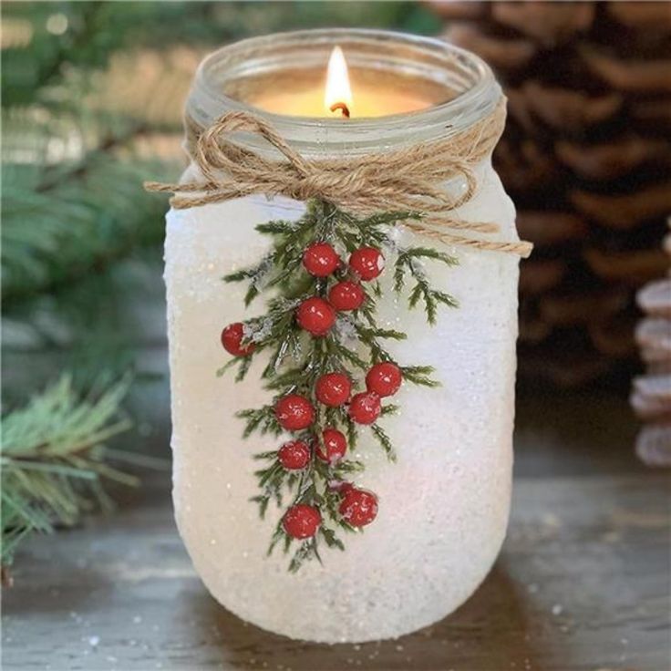 The Jar Is Covered In Frosting, Has A Burlap Rope Tied Around The Top And Is Decorated With Mistletoe Sprigs To Really Give It A Christmas Spirit, Look And Feel. Our Candles Are Handmade In Using 100% Soy Wax. The Wax Is Hand-Poured Into A Mason Jar With A Cotton Wick This 18 Oz Candleholder Measures 4.1x3.9 Inches And Burns For Up To 70-80 Hours! Breathtaking Notes Of Pine & Cedarwood Fragrance Transports You Into A World Of Tall Snow Covered Trees In An Enchanted Forest! A Thoughtful Gift For Women That Are As Unique As She Is, Guaranteed To Bring Warmth And Joy During The Cold Season! Christmas Mason Jars, Christmas Jars, Mason Jar Candles, Unique Candles, Christmas Decor Ideas, Jar Candle, Jar Crafts, Unique Christmas Gifts, Decoration Christmas