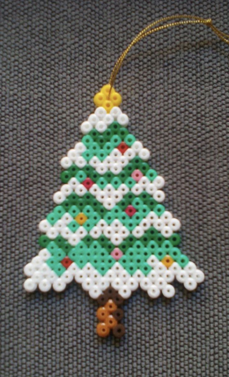 a christmas tree ornament made out of perler beads