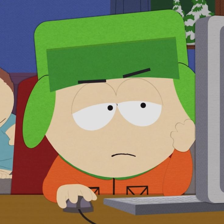 an animated image of a man with a green hat on looking at a computer screen