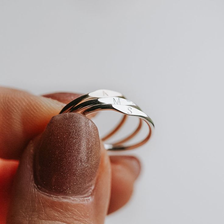 A Dainty Tiny Signet Ring, customised with a letter/initial of your choosing. The perfect ring for stacking! Each letter is hand stamped in our 1.5mm tiny block font (uppercase only). Available in sizes 2 US to 15 US Need help with sizing? Look at our size guide or purchase our ring sizer Due to its handmade nature, there may be some colour variances where the solder seam is Each Stamp + Shine piece is made from scratch in our little studio in Melbourne, Australia. The process begins with a clea Clean Metal, Block Font, Thank You Presents, Block Fonts, Silver Signet Ring, How To Clean Metal, Metal Sheet, Made From Scratch, Ring Sizer