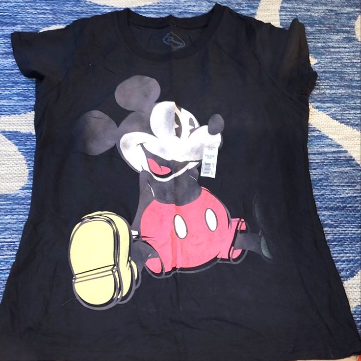 Disney Mickey Mouse Women's Tee Shirt Fun Black Short Sleeve Shirt, Black Shirt With Character Print, Casual Black Shirt With Character Print, Fun Black Shirt With Character Print, Cute Black Shirt For Streetwear, Trendy Black Shirt With Character Print, Fun Black Short Sleeve Tops, Fun Black Top With Cartoon Print, Black Cute Shirt For Streetwear