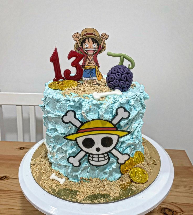 a birthday cake decorated with a pirate theme