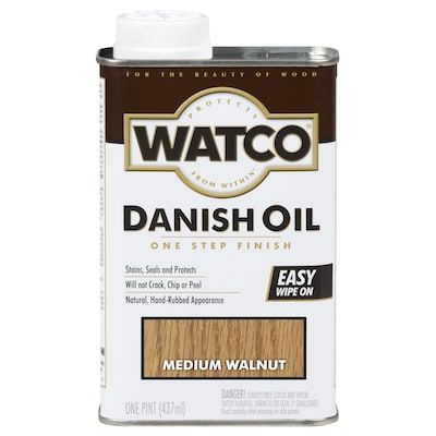 a can of golden oak danish oil with the words watco on it's side