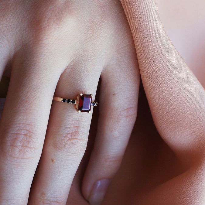 Beautifully stunning, this Deco-inspired ring features Garnet and black diamonds and is sure to turn heads. Modern Rings, Contemporary Bride, Almandine Garnet, Modern Ring, Black Diamonds, Geometric Lines, Garnet Rings, Red Garnet, Black Diamond