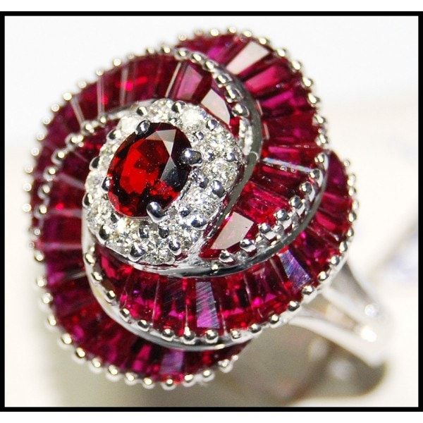 Our jewelry is entirely handmade in our Thailand studio. We focus on bringing creative and symbolic design to fine jewelry crafted in precious metal and set with superior quality gemstones and diamonds. For more Ruby Rings, click here: https://www.etsy.com/shop/BKGjewels?section_id=18901601 Ring information Metal: White Gold 18 Karat Gold Weight: 8.00 grams Size: 7 (US)  N (UK) Appraisal Value: $5899 Ruby information: Shape or Cut: Oval and Square Quantity: 1 and 44 Stones Total Weight: 0.45 and 4.36 carats (100% Genuine Natural) Clarity: Eye very clean Color: Red Diamond information: Shape or Cut: Round Brilliant Quantity: 12 Stones Total Weight: 0.23 carats (100% Genuine Natural) Clarity: Eye clean SI1-2 Color: G-H Colorless FEATURES - This item can be made with a variety of gemstones or Diamond Cocktail Ring, Sapphire Solitaire, Ruby Pendant, Diamond Cocktail Rings, Ruby Jewelry, Earrings Unique, Sapphire Earrings, Ruby Diamond, Gorgeous Jewelry