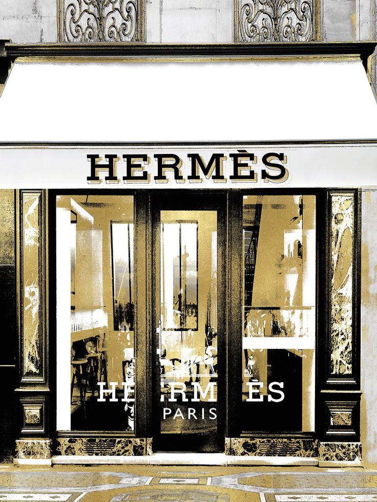 a store front with the words hermes on it