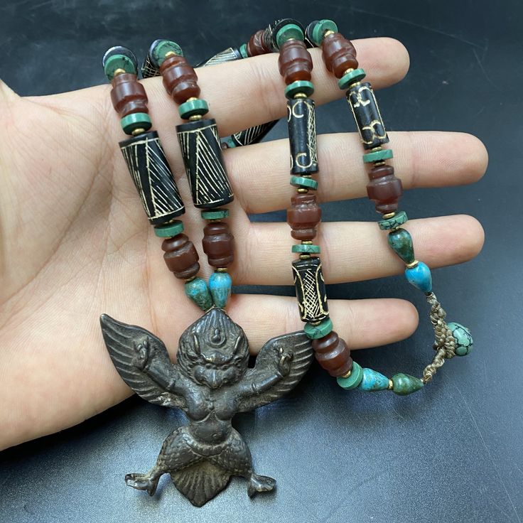 Very Unique Rare Old Mix Tibetan Garuda pendent And Pyu Beads Red agate black jade  Green Turquoise  Necklace Artisan Pendant Jewelry With 108 Beads, Spiritual Style Pendant Beaded Necklace With Polished Beads, Artisan Jewelry Pendant With 108 Beads, Spiritual Beaded Pendant Necklace With Polished Beads, Spiritual Pendant Beaded Necklace With Polished Beads, Amulet Style Gemstone Beads For Jewelry Making, Amulet Style Beaded Necklaces For Jewelry Making, Artisan Beaded Necklace With 108 Beads Pendant, Traditional Jade Beaded Necklaces With Gemstone Beads