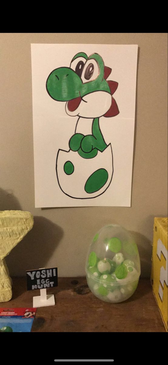 an image of a cartoon character on the wall next to some toys and paper crafts