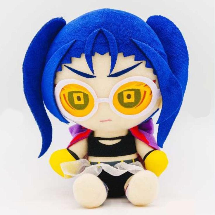 a stuffed toy with big yellow eyes and blue hair