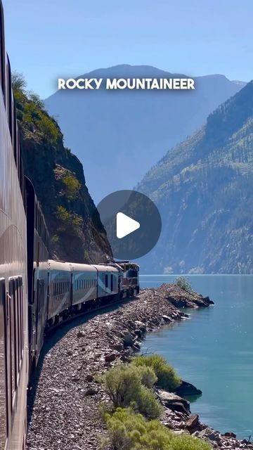 the rocky mountaineer train is going down the tracks next to the water and mountains