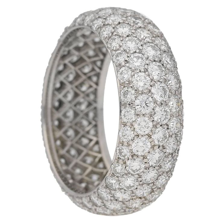 Vintage Tiffany & Co. five row diamond ring. Set with one hundred and forty five round brilliant cut diamonds in open back grain settings with a combined approximate weight of 4.35 carats, to a smoothly conforming bombé shape band, set throughout with five rows of diamonds, graduating in size, with intricate pierced lattice backholing, approximately 7.5mm in width. Marked platinum, signed 'TIFFANY & CO.', American, circa 1970, accompanied by Tiffany & Co. box. UK finger size N. Please note ship Art Deco Sapphire Engagement Ring, Diamond Aesthetic, Vintage Platinum Rings, Diamond Band Rings, Royal Diamond, Sapphire And Diamond Band, Tiffany And Co Jewelry, Tourmaline Engagement Ring, Antique Jewelry Rings