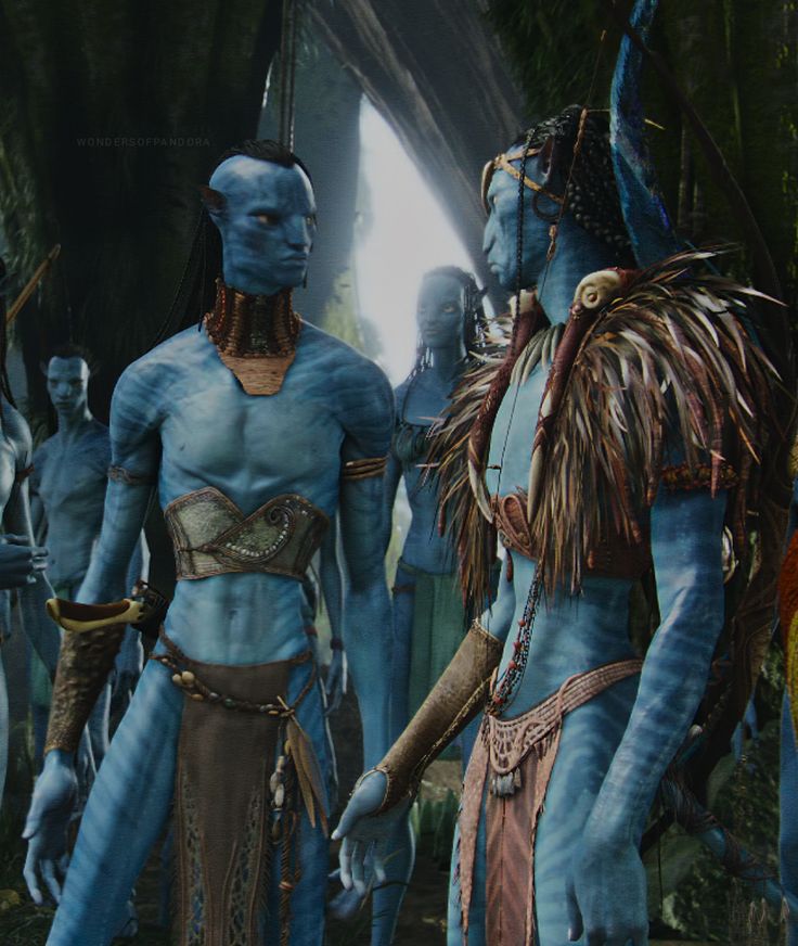 two blue men standing next to each other