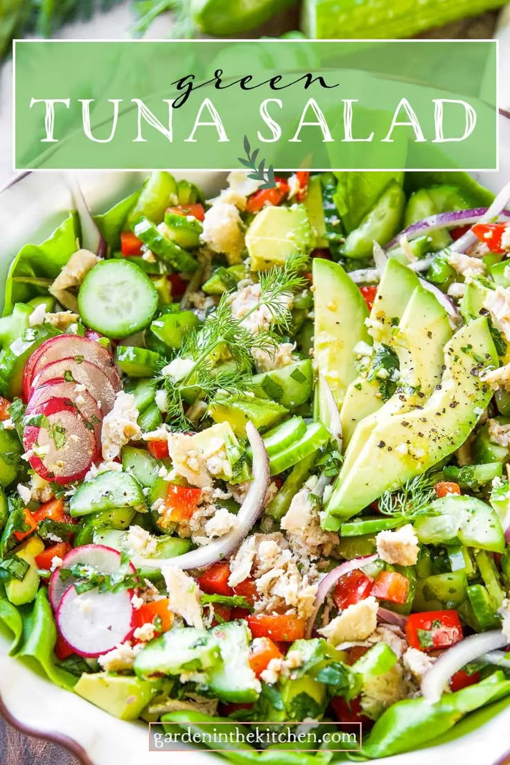 a salad with cucumber, radishes and other vegetables in a white bowl