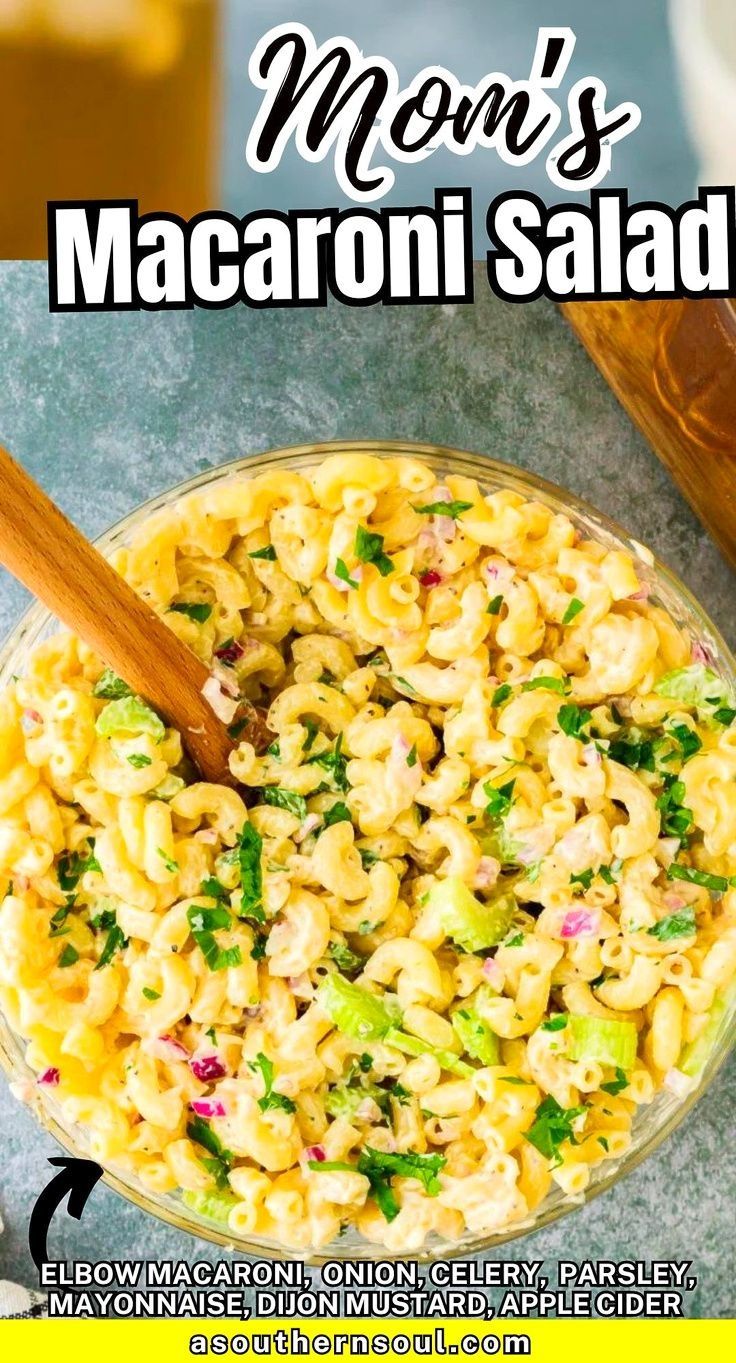 macaroni salad with broccoli and parsley in a glass bowl