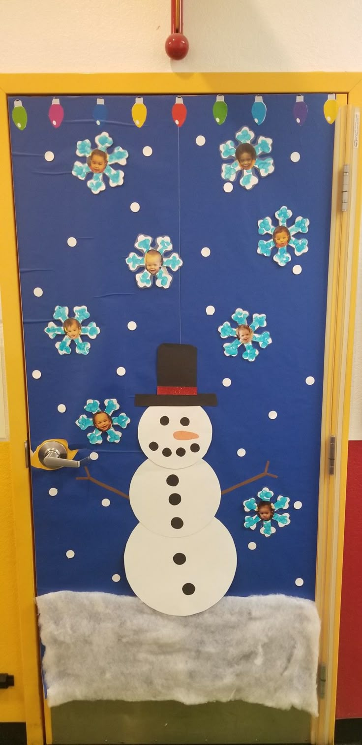 a door decorated with a snowman standing in front of the frosting on it