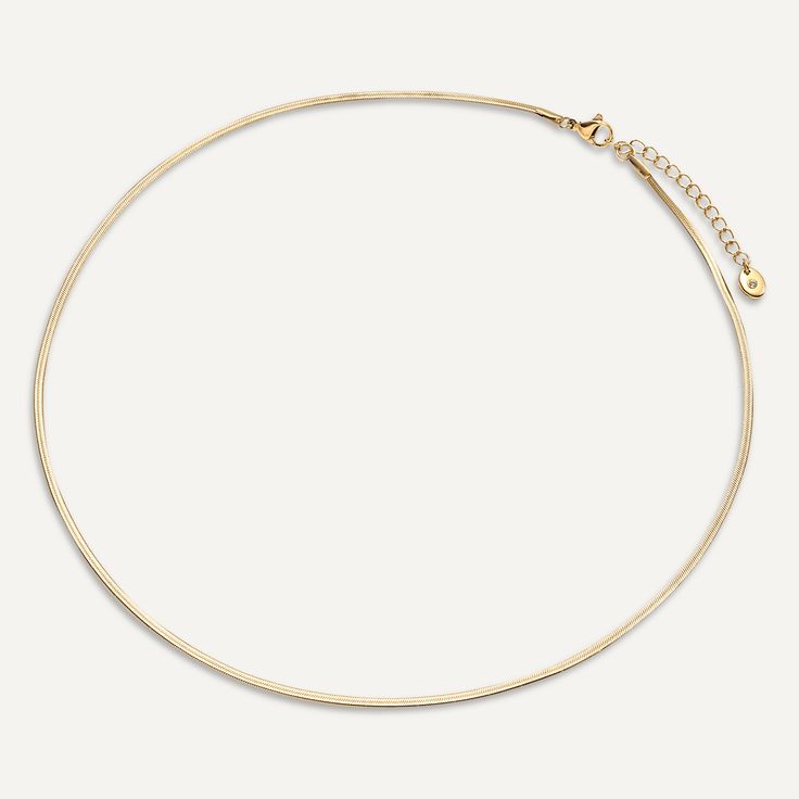 This piece features a refined and slender serpent chain design that adds an elegant touch to any outfit. Crafted from 18K gold-plated stainless steel, it is durable, water-proof, and tarnish-free. Product Code: DN2683K Collection: Vibes Type: Clasp Material: 18K Gold-Plated Stainless Steel Dimensions: Length 40-44cm Pendant Dimensions: Style: Sleek Includes: Sleek Gold Metal Jewelry, Minimalist Snake Shape Necklace With Adjustable Chain, Gold Minimalist Snake Chain Choker Necklace, Minimalist Gold-plated Herringbone Necklace, Minimalist Gold Plated Herringbone Necklace, Elegant Everyday Chain Necklace With Snake Shape, Elegant Snake-shaped Chain Necklace For Everyday Wear, Gold Minimalist Herringbone Necklace, Elegant Everyday Snake Shape Chain Necklace