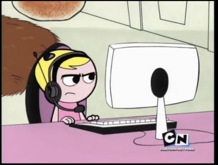 a cartoon character sitting at a computer with headphones on