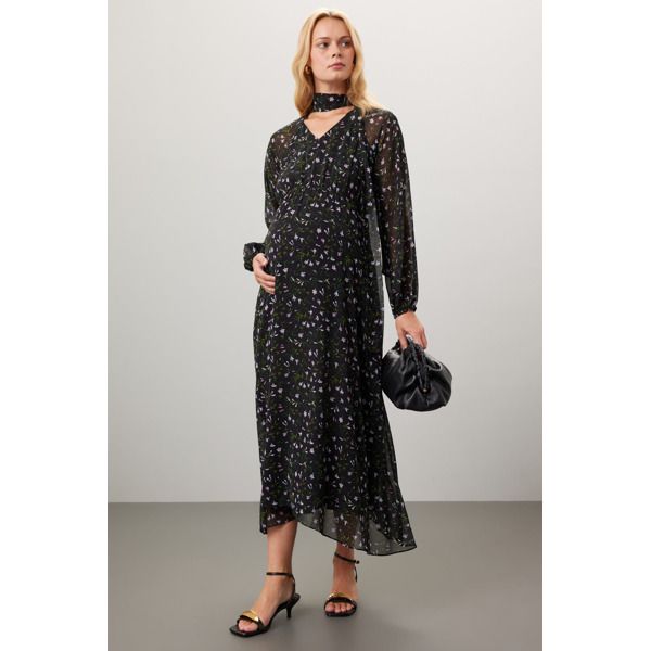 Multicolor floral chiffon (100% Polyester). A-line. Long sleeves. Tie neck. Pull on. 51.5" from shoulder to hemline. Imported. Chiffon A-line Dress For Date Night, Elegant Flowy A-line Floral Dress, Chic Maxi Floral Dress With Ditsy Print, Chic Ditsy Floral Print Maxi Dress, Flowy Floral Print Chiffon Party Dress, Flowy Floral Chiffon Party Dress, Elegant Maxi Floral Dress With Ditsy Print, Dressy Floral Print Maxi Dress For Date Night, Elegant Ditsy Floral Print Maxi Dress