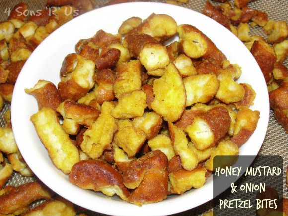 a white plate topped with fried food on top of a table