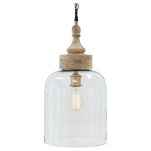 a clear glass and wood pendant light