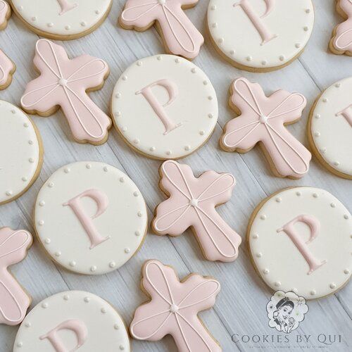 decorated cookies with the letters p, d, and e on them are laid out next to each other