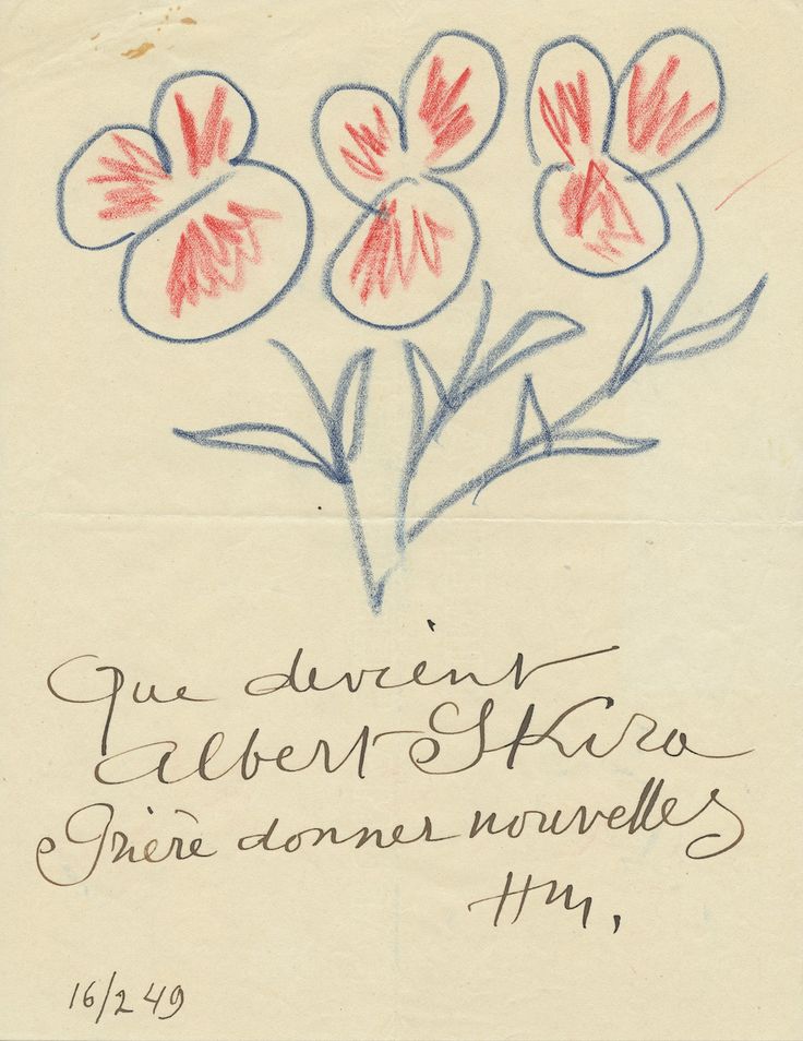 an old handwritten note with flowers in the center and writing on it that says,