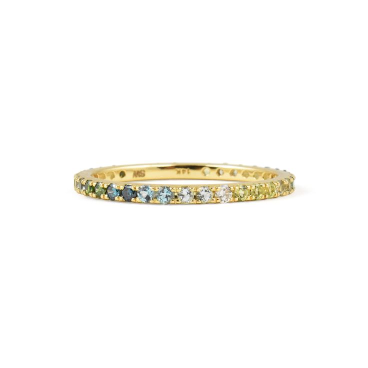 Introducing the Stevie Wren Gemstone Micro Pave Eternity Band – a true embodiment of elegance and personal expression. Elevate your style with our signature 14k gold eternity band, meticulously crafted for those who appreciate versatility and sophistication. Designed with you in mind, our stackable band boasts a spectrum of versatile color combinations, allowing you to curate the perfect look that resonates with your unique style. The micro pave setting enhances the band's allure, creating a mes Luxury Yellow Gold Multi-stone Eternity Band, Luxury Multi-stone Yellow Gold Eternity Band, Luxury Yellow Gold Eternity Band With Multi-stone, Yellow Gold Gemstone Eternity Band For Anniversary, Elegant Yellow Gold Eternity Band With Gemstone, Fine Jewelry Multi-stone Round Cut Eternity Band, Fine Jewelry Eternity Band With Multi-stone Round Cut, 14k Gold Multi-stone Eternity Band, 14k Gold Gemstone Eternity Band For Anniversary