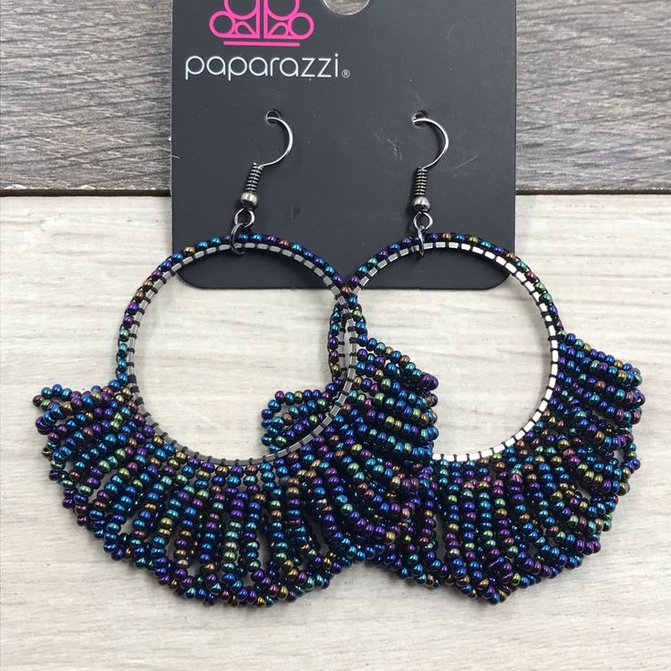 “Can’t Bead-Lieve My Eyes!” Multi Color Hoop Earrings Rings Of Oil Spill Beads Cascade From The Bottom Of A Matching Beaded Hoop Creating Colorful Fringe New In Original Packaging Paparazzi Jewelry Or Accessories 3 For $19 Or 4 For $25 Bohemian Purple Hoop Earrings With Round Beads, Purple Beaded Hoop Earrings With Round Beads, Purple Beaded Round Hoop Earrings, Purple Hoop Earrings For Party, Blue Bohemian Hoop Earrings For Party, Bohemian Blue Hoop Earrings For Party, Blue Beaded Metal Hoop Earrings, Blue Nickel-free Hoop Earrings For Party, Round Beads Hoop Earrings With Ear Wire For Party