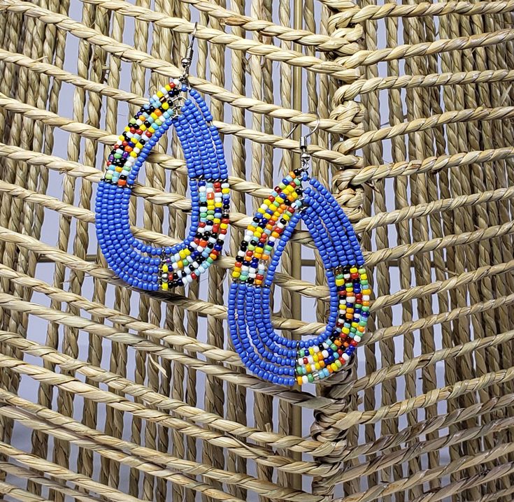 Experience fashion-forward style with our Teardrop Style Handmade Earrings. Featuring colorful seed beads, these earrings are unique and colorful, ensuring a one-of-a-kind look. Elevate any outfit with these teardrop earrings that are sure to turn heads. Blue Teardrop Earrings With Tiny Beads, Multicolor Beaded Teardrop Dangle Earrings, Multicolor Beaded Teardrop Earrings For Gift, Multicolor Teardrop Beaded Earrings With Tiny Beads, Multicolor Teardrop Beaded Earrings, Multicolor Teardrop Earrings With Colorful Beads For Gift, Multicolor Beaded Teardrop Earrings, Multicolor Teardrop Beaded Earrings With Large Beads, Multicolor Teardrop Earrings With Dangling Beads