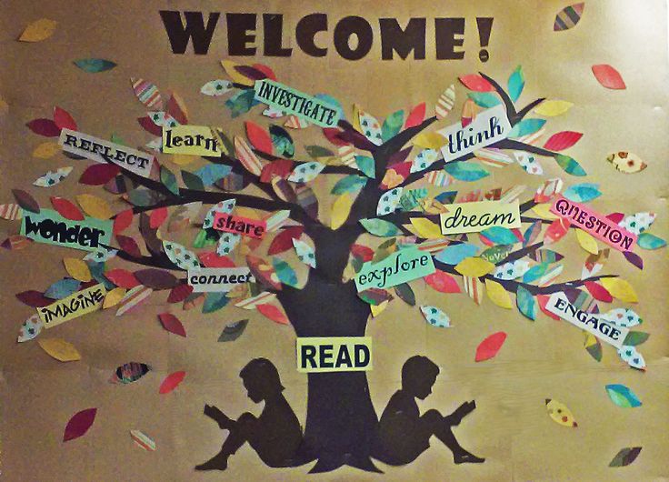 a bulletin board with children sitting under a tree and the words welcome written on it