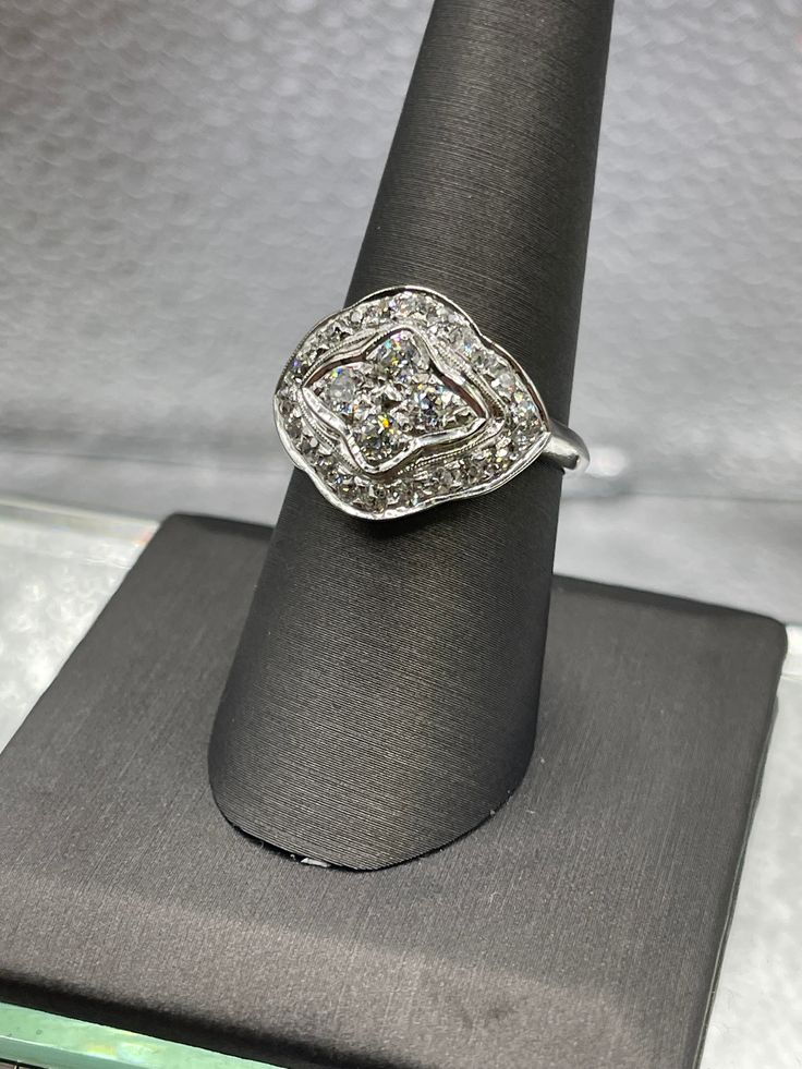 A stunning ladies antique 14 karat solid white gold 2.50 carat diamond dome cocktail ring.  A gorgeous antique ring that's truly one of a kind!   Dripping with sparkle!  This fabulous women's antique diamond ring is very special and in need of a special woman to love it. Weight:  5.1 grams Total Diamond Weight: 2.50 carats Size:  9 Our Price $3695.00 Regularly Priced At $4800.00 Please See Our Video Remember - If you're purchasing for yourself or a gift for a loved one, buy with confidence.  We White Gold Dome Ring For Anniversary, Elegant Dome Ring With Center Stone For Anniversary, Collectible Platinum Diamond Ring In Diamond White, Collectible Diamond White Platinum Diamond Ring, Silver Dome Ring Fine Jewelry, White Gold Cubic Zirconia Dome Ring Fine Jewelry, Fine Jewelry White Gold Dome Ring With Cubic Zirconia, Dazzling Rose Cut Diamond Platinum Jewelry, White Gold Dome Ring With Cubic Zirconia