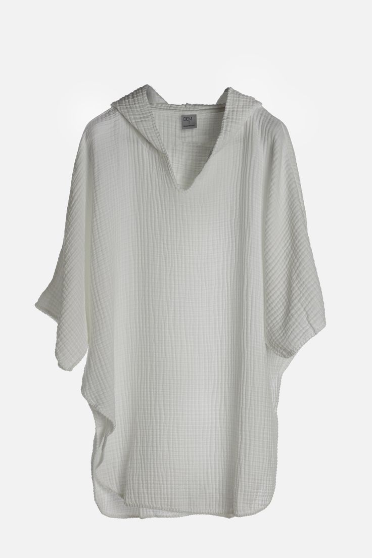 Our most beloved piece for summer. This one piece, super soft, cuddly poncho is perfect for the beach or at home over our Koza Pants. The cocoon like texture warms you up immediately. Easy to fold and take anywhere as it would not have wrinkles. Water absorbent and dries quickly. Oversized White Cover-up For Loungewear, Relaxed Fit Summer Loungewear Cover-up, Oversized Spring Poncho For Loungewear, Comfortable White Sleepwear For Vacation, Spring Loungewear Poncho With Batwing Sleeves, Summer Relaxed Fit Cover-up For Loungewear, Casual Poncho For Spring Loungewear, Casual One Size Poncho For Vacation, Casual Spring Poncho For Loungewear