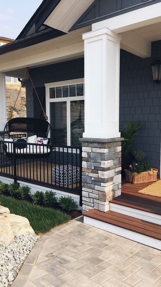 a front porch with steps leading up to it