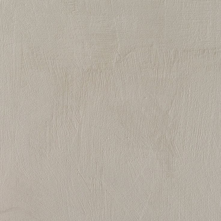 a white wall that has some kind of textured paper on it and is very soft