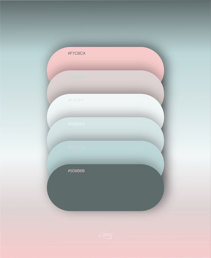 a stack of different colored papers sitting on top of a white and pink background with the word