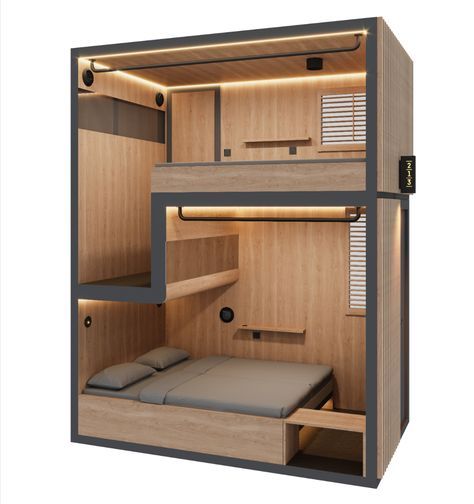 the bunk bed is built into the wall and has two shelves on each side with lights above it