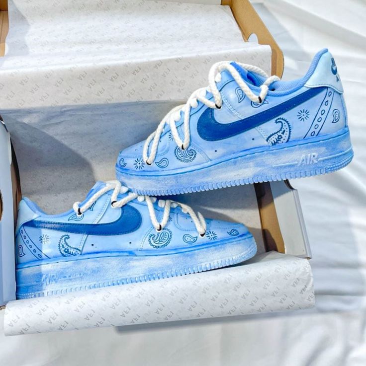 Leave an indelible mark on your kicks with this custom Blue Bandana Air Force 1. With a dynamic pattern and vibrance, you'll step out in style and take the risk of being truly unique. Dare to be bold! 🤠 Exactly as shown in the pictures. 📷 Brand New & Authentic. 💯 Hand Painted with attention to detail. 👨‍🎨 Waterproof and Flexible. ❤️ Unisex model. Please refer to the Size Chart. 👟👫 Free Worldwide Shipping. ✈️🌍 Blue Breathable Custom Sneakers For Streetwear, Custom Blue Low-top Sneakers, Blue Low-top Custom Sneakers, Blue Custom Sneakers With Rubber Sole, Custom Blue Sneakers With Rubber Sole, Custom Blue Sneakers, Blue Custom Style Sneakers, Blue Custom Sneakers For Streetwear, Custom Blue Sneakers For Streetwear