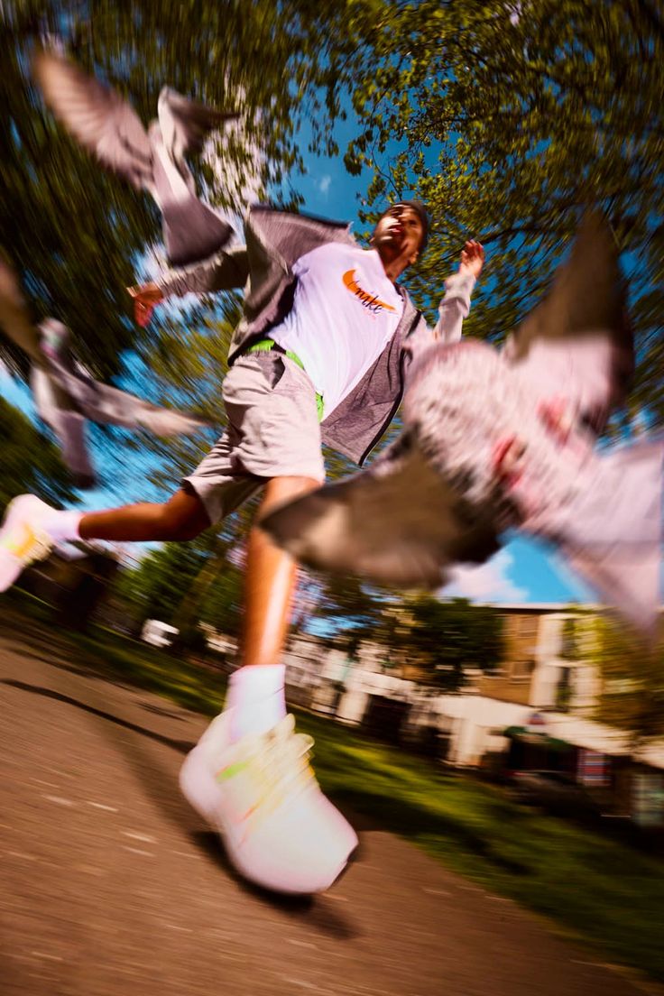 a man riding a skateboard through the air