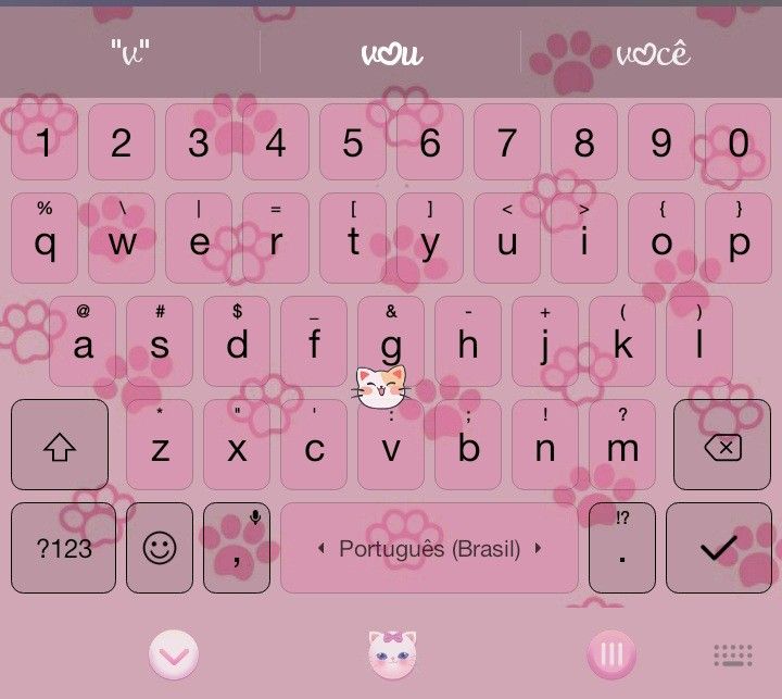 the keyboard is pink and has hello kitty characters on it, as well as other letters