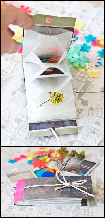 someone is making an origami flower out of a book and it's open