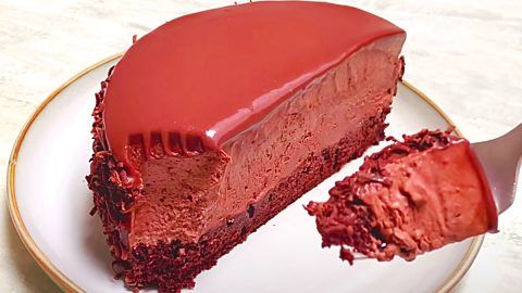 a piece of red velvet cake on a white plate