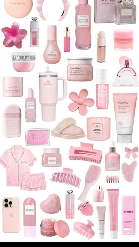 the contents of a woman's pink perfume set