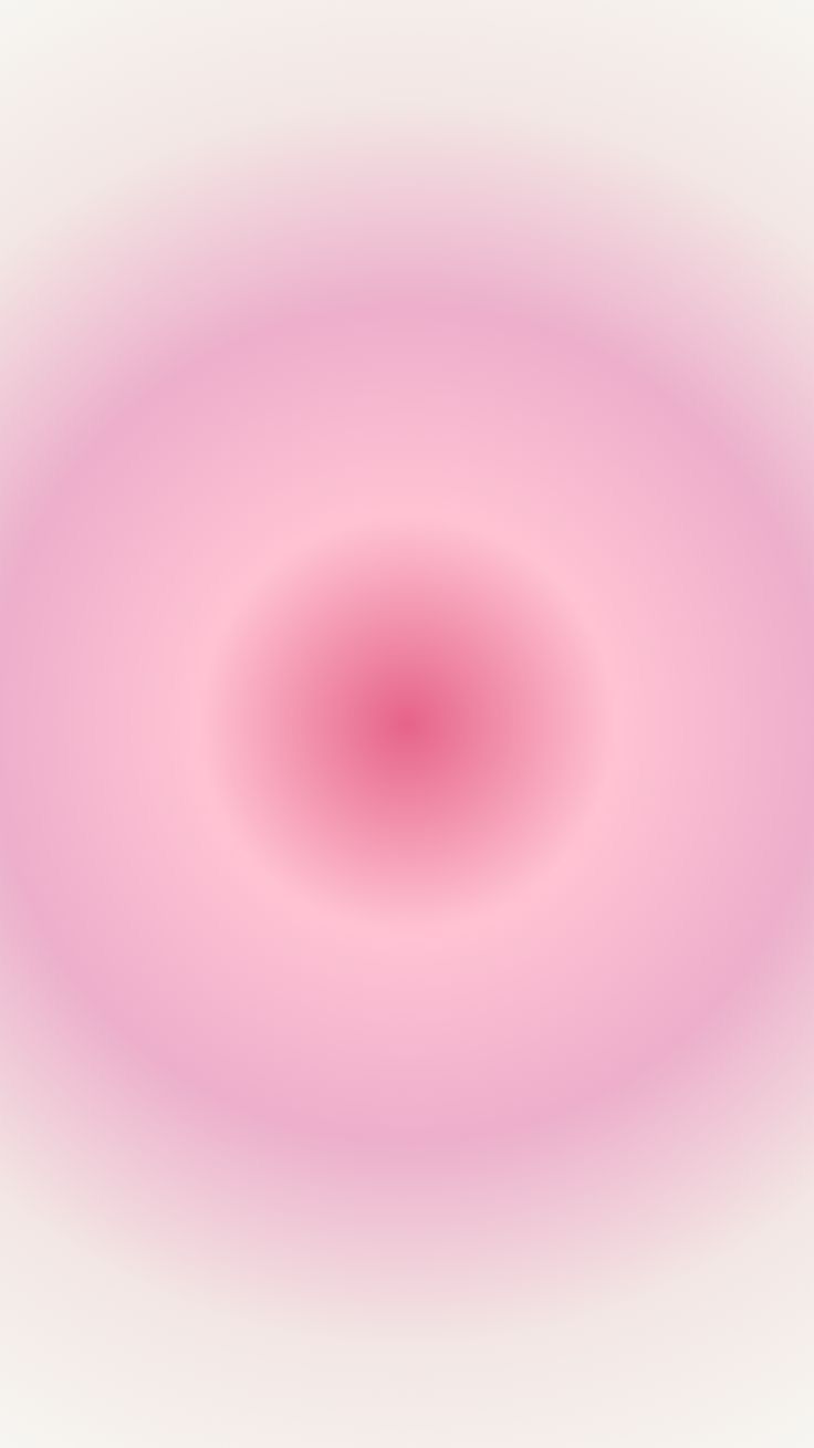 an abstract pink and white background with a circular design in the center, as if it were blurred or blurry