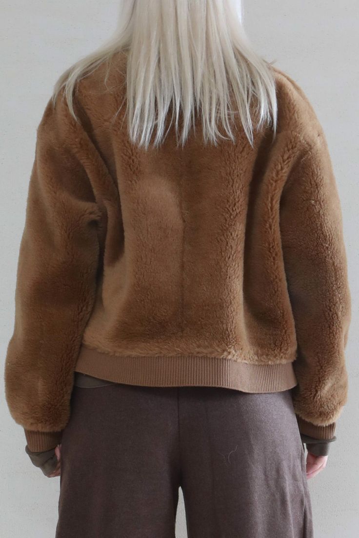 This baseball jacket inspired teddy coat is a definite wardrobe staple. It has a thick layer of lamb shearling that shines and keeps you warm. Featuring button closure and trimmed edges that keeps the cold air out. Style #: WWAH903 Plush Coat, Cocoa Brown, Teddy Jacket, Teddy Coat, Brown Jacket, Cold Air, Winter Essentials, White Jacket, Baseball Jacket