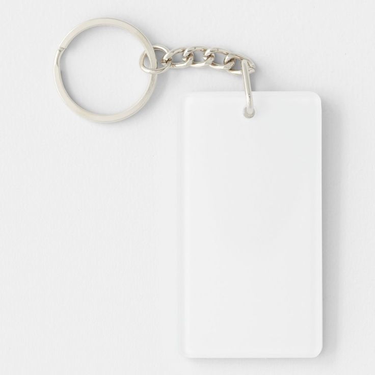 a white keychain with a blank tag attached to it