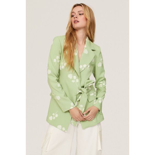 Green floral crepe (97% Polyester, 3% Elastane). Blazer. Long sleeves. Collar. Tie closure. 31" from shoulder to hemline. Imported. Formal Floral Print Outerwear For Spring, Chic Spring Floral Print Outerwear, Chic Spring Outerwear With Floral Print, Chic Floral Print Outerwear For Spring, Chic Floral Print Formal Outerwear, Chic Floral Print Outerwear For Brunch, Elegant Floral Print Office Outerwear, Chic Floral Print Outerwear For Office, Chic Floral Print Office Outerwear