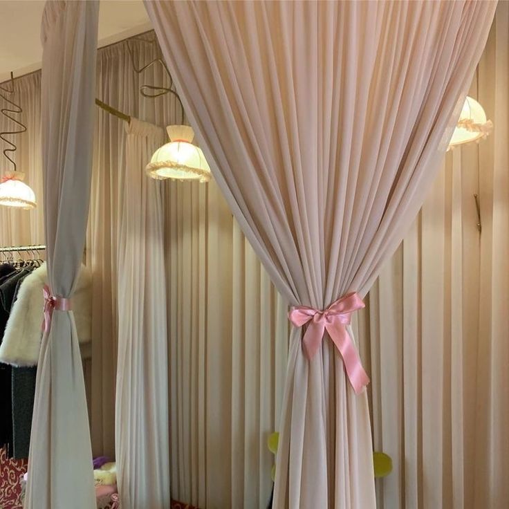 the curtains are open and ready for someone to see in their closet or dressing room